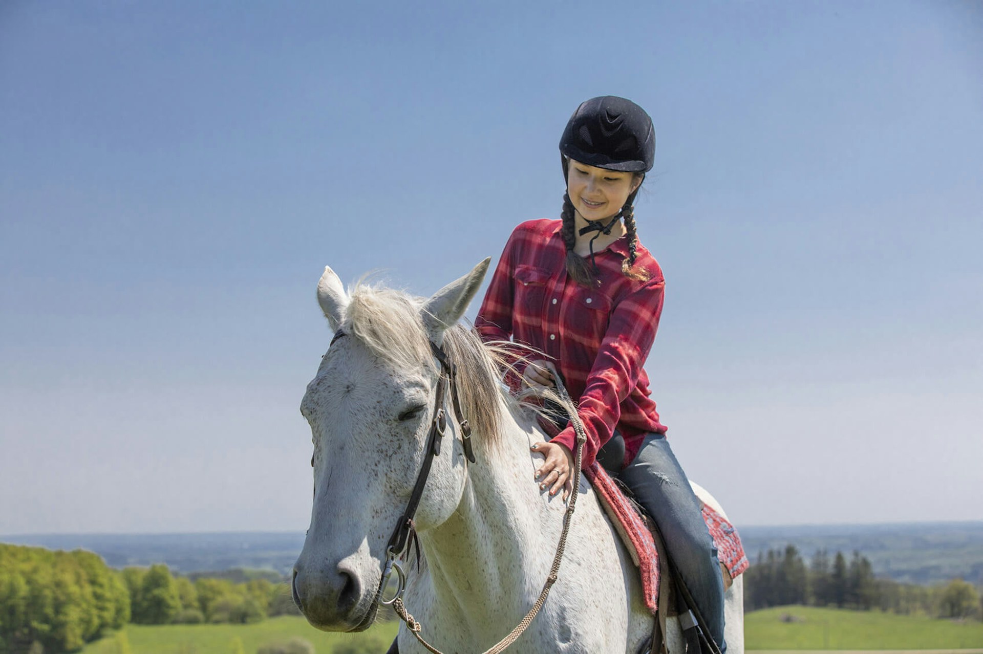 Girl Horseback riding